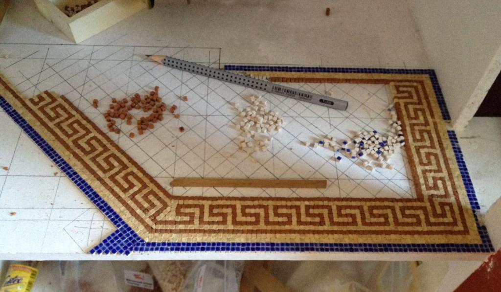 Das Verkleben der einzelnen Mosaiksteine